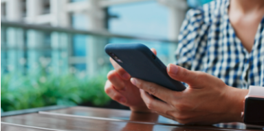 Woman holding mobile phone